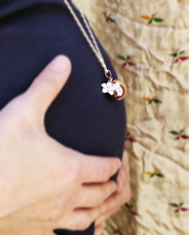 Pregnancy bola necklace in gold- or silver-plated brass