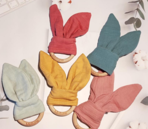 Wooden teething ring and cotton gauze rattle comforter