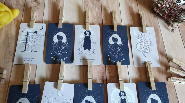 Wooden clothespins (clothes pegs) engraved with birth mantras