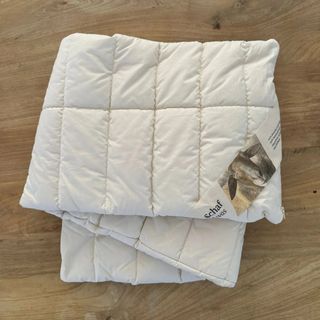 Quilted cotton and wool cover for the Sassoupi support pillow